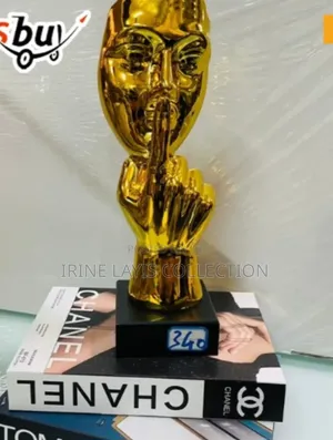 79 Gold Porcelain "Hush" Gesture Sculpture.