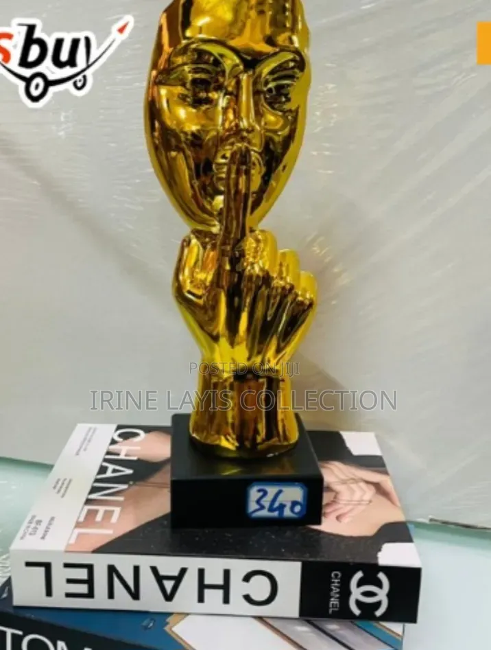 79 Gold Porcelain "Hush" Gesture Sculpture.