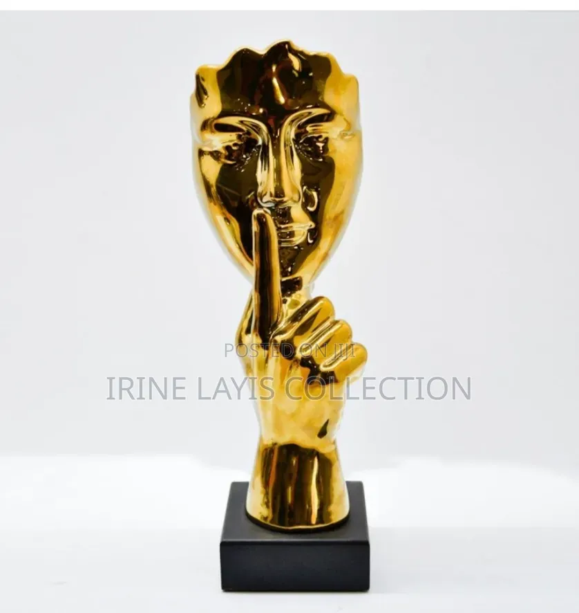 79 Gold Porcelain "Hush" Gesture Sculpture.