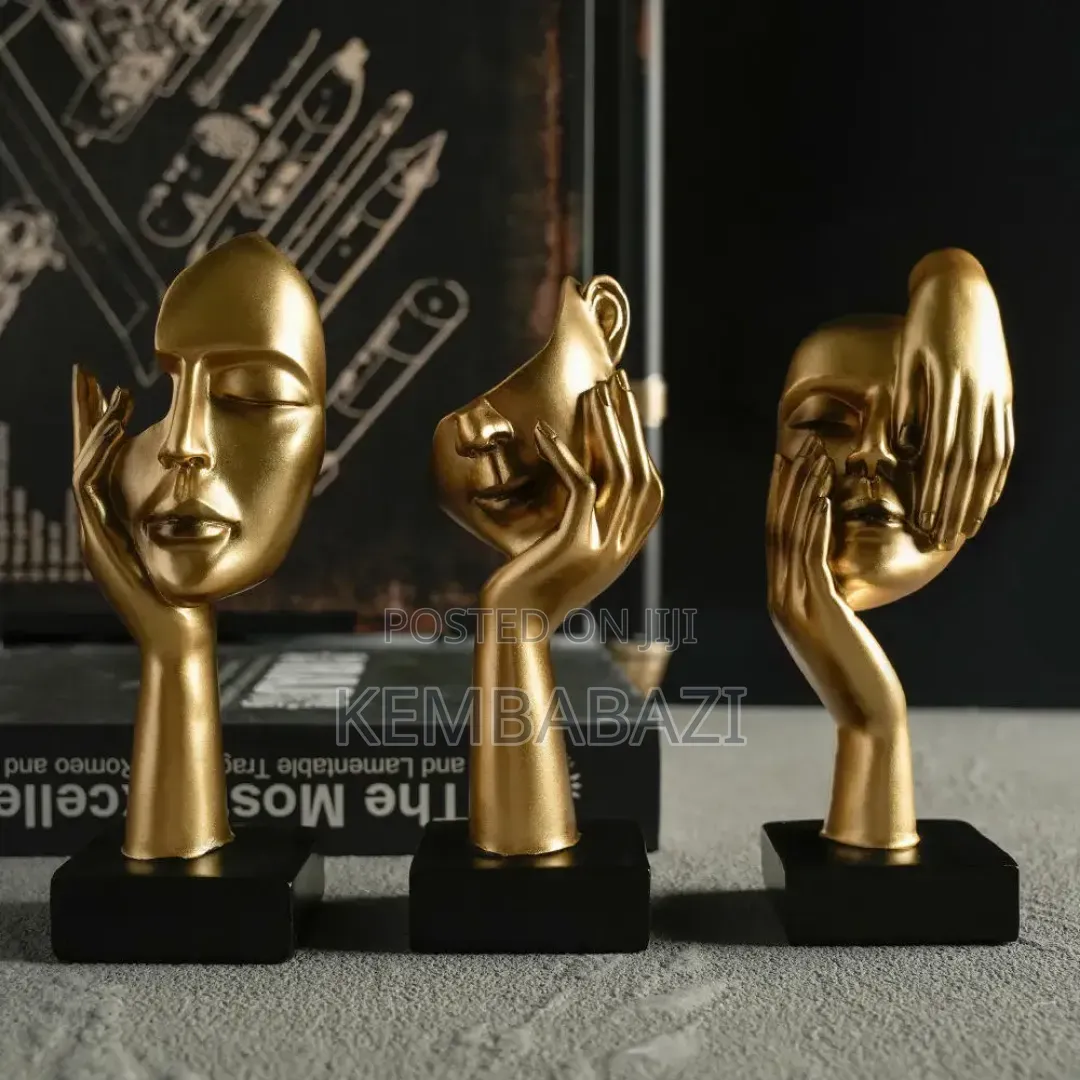 Set of Three Golden Abstract Face Sculptures