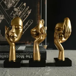 Set of Three Golden Abstract Face Sculptures