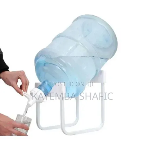 Storage Rack Used To Hold Large Water Jugs And Dispense Water.