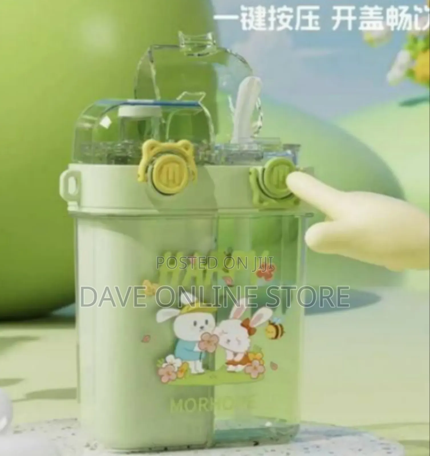 Divided Water Bottle With a Straw and a Pop-Up Lid