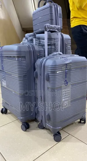 Lightweight Plastic Suitcase Set of 4 - Durable Travel Companion