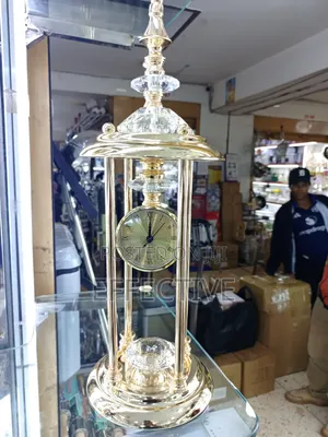 Decorative Gold-Toned Metal and Crystal Table Clock Centerpiece.