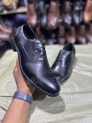Black Leather Oxford Brouge Dress Up Shoes With a Lace Up Closure
