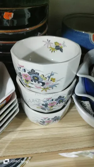 Japanese White Ceramic Rice Bowls Featuring a Delicate Floral Design
