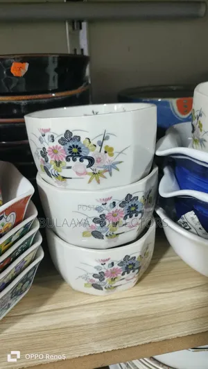 Japanese White Ceramic Rice Bowls Featuring a Delicate Floral Design