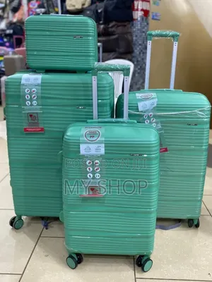 4 Piece Travel Luggage Set - Strong Rolling Kwanjula Suitcases