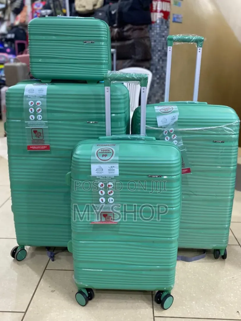 4 Piece Travel Luggage Set - Strong Rolling Kwanjula Suitcases