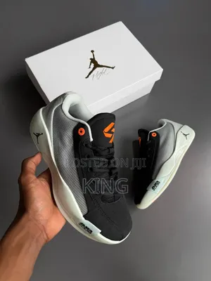 .Nike Jordan Luka .77 Sneakers in the Light Silver and Hyper Crimson