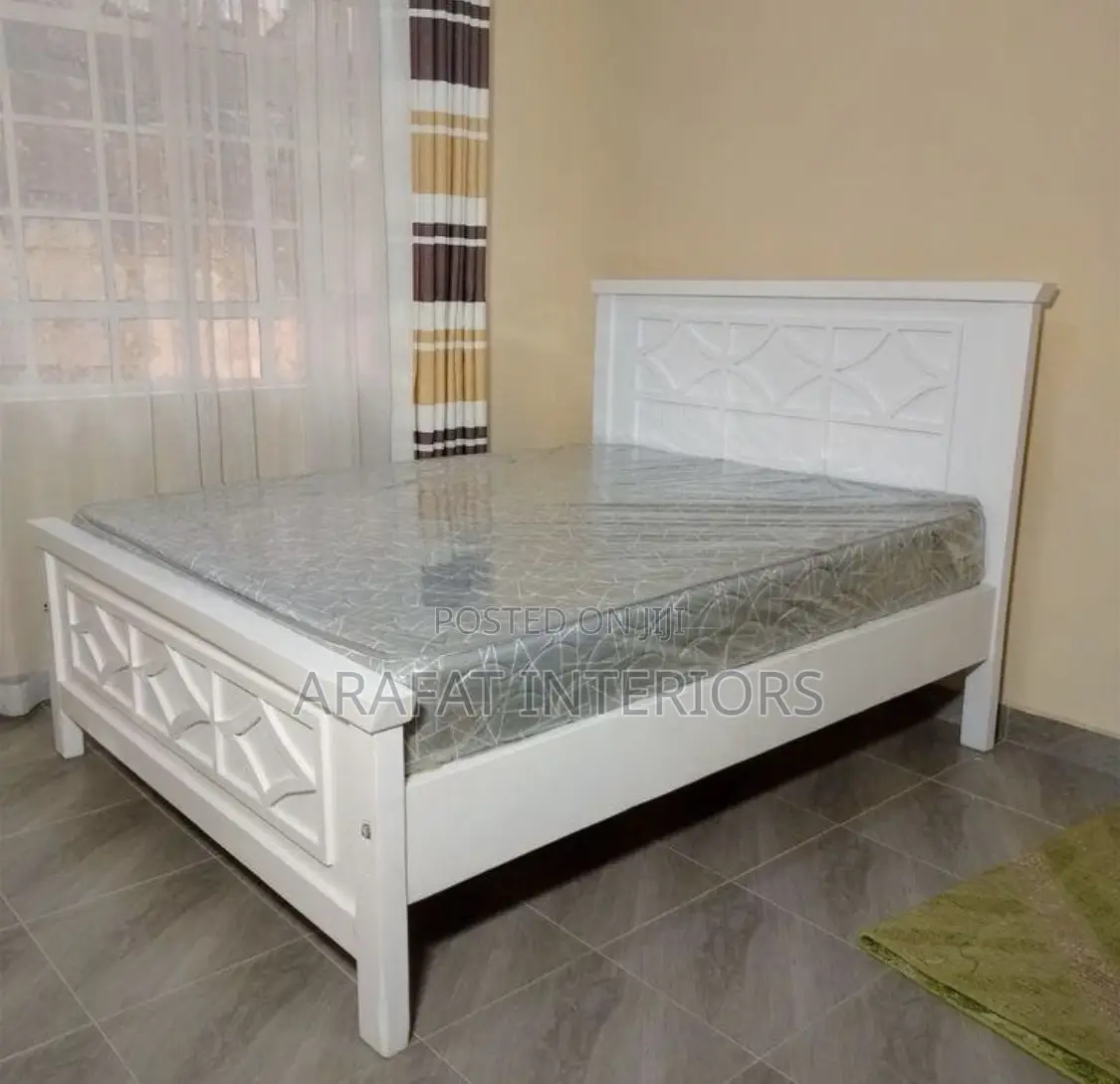 Crafted White Wooden Bed