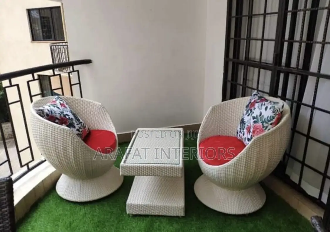 White Woven Swivel Egg Chairs