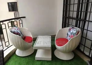 White Woven Swivel Egg Chairs