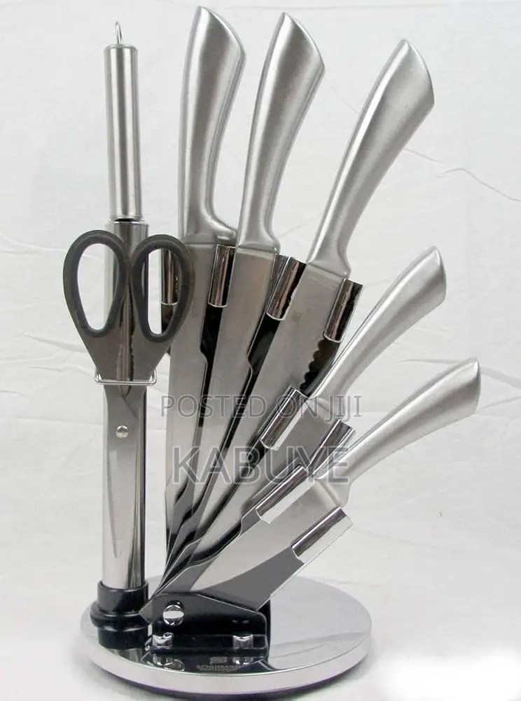 Kitchen Knife Set With an Acrylic Revolving Stand.