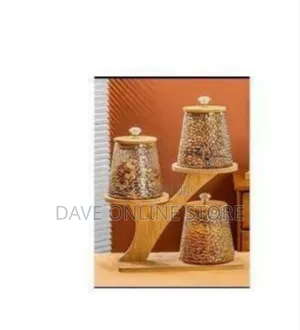 Decorative Patterned Glass Storage Canister Set on Tiered Wood Stand