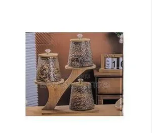 Decorative Patterned Glass Storage Canister Set on Tiered Wood Stand