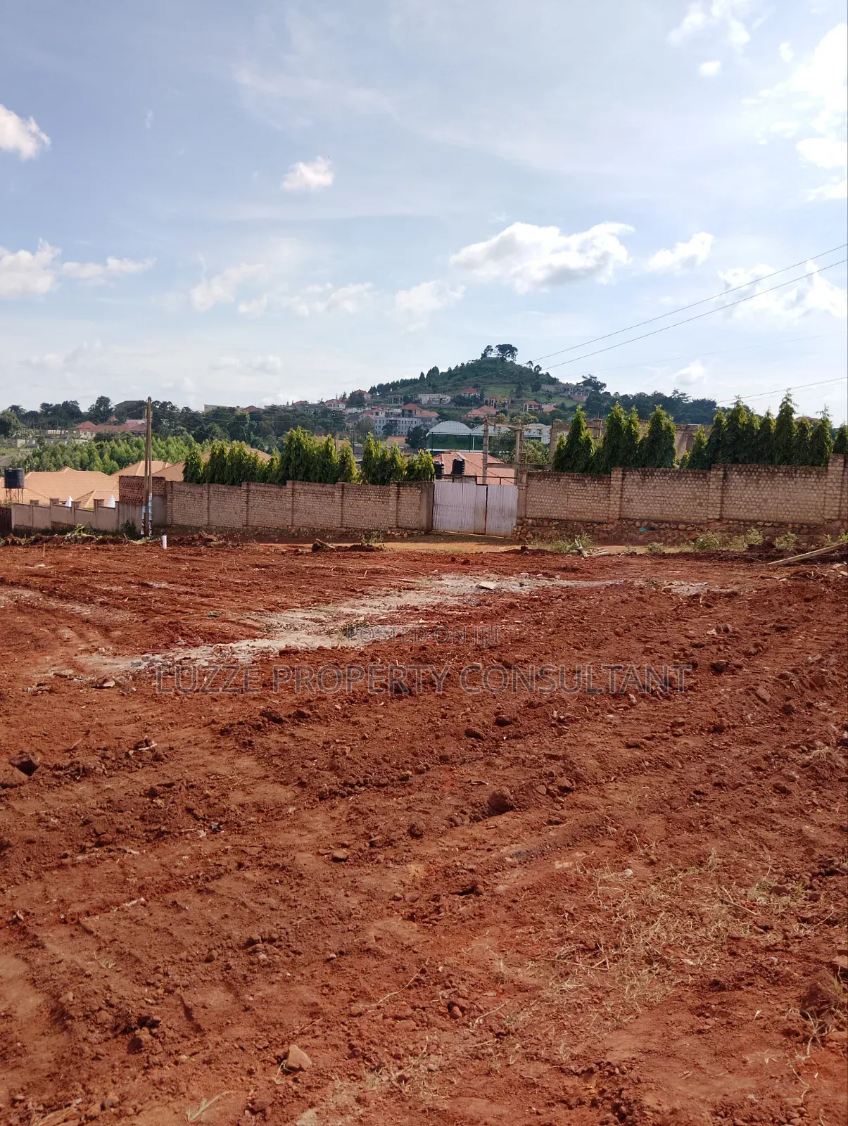 50*100 Plots for Sale in Buloba Winmond Hotel Smiling Star School Rd