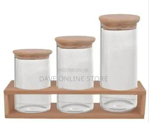 Cylindrical Glass Canister Set With Wooden Lids and Display Rack