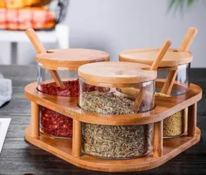 3-Piece Rotating Condiment Set With Clear Jars and Wooden Accessories