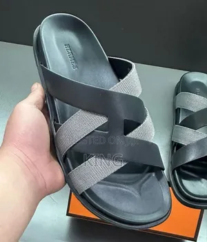 Hermès Kazimir Sandals in Noir Black, Brown