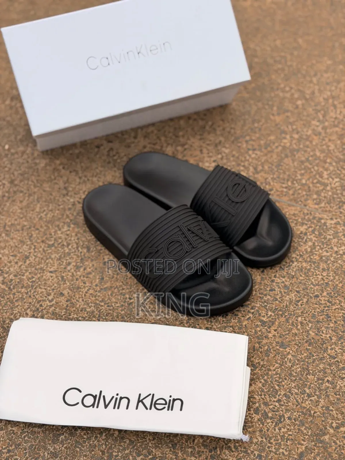 Calvin Klein Jeans Triple Black Slides.