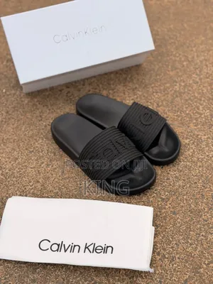 Calvin Klein Jeans Triple Black Slides.