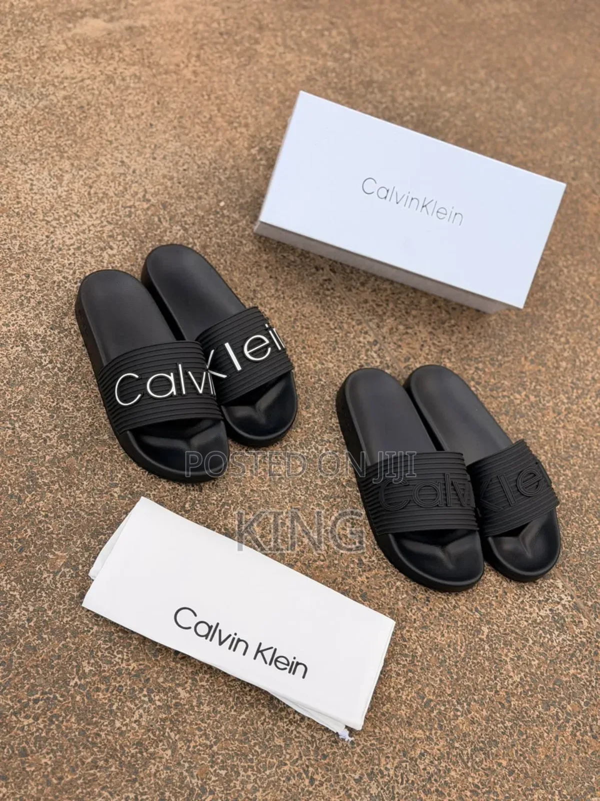 Calvin Klein Jeans Triple Black Slides.