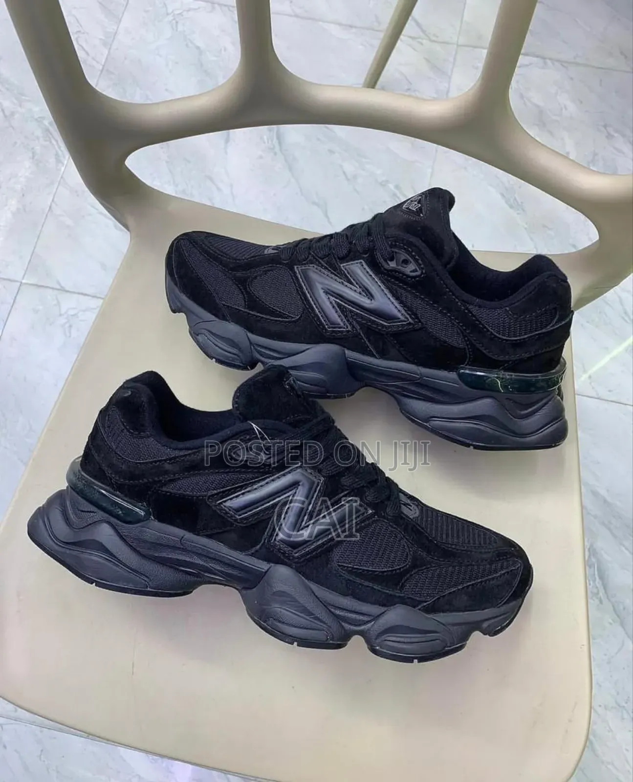 New Balance 9060 Triple Black Sneakers.