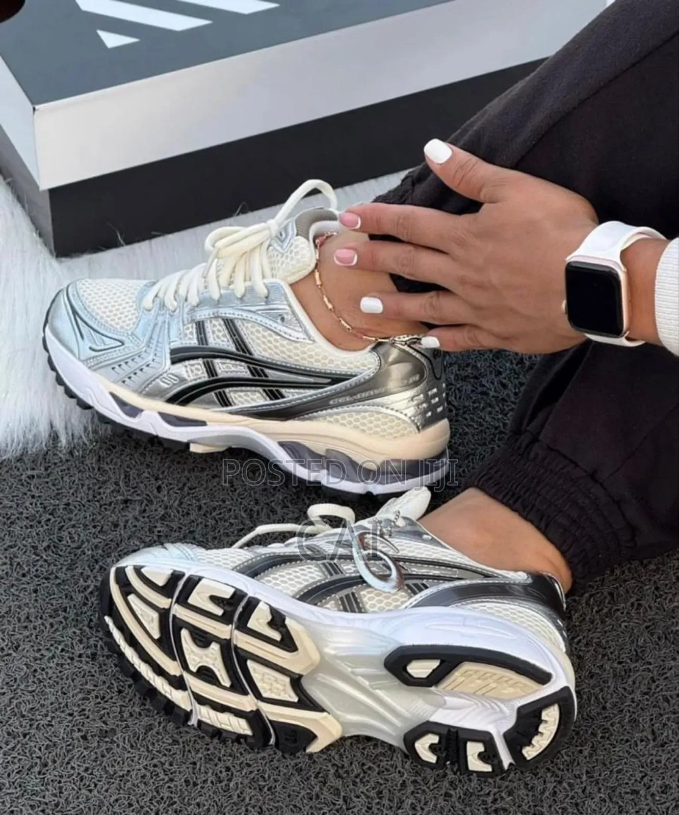 Asics Gel-Kayano 14 Sneakers in a Cream, Black, and Metallic Silver