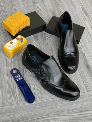 Franco Banetti Black Leather Slip-on Formal Shoes. Brogue Wingtoe