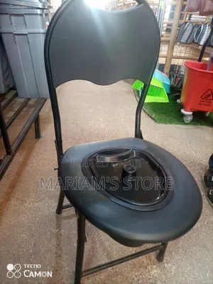Black Folding Adult Potty Chair Or Bedside Commode.