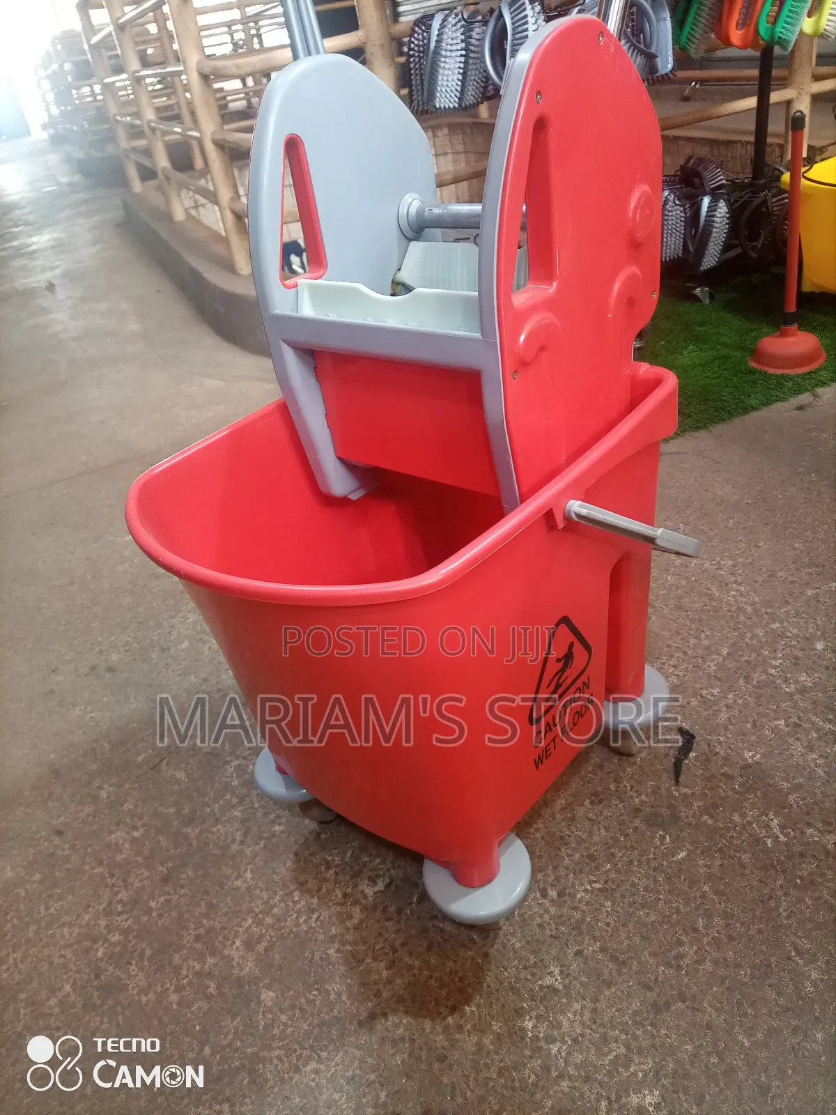 Commercial Red Plastic Mop Bucket With a Built-in Wringer and Wheels