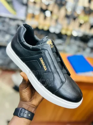 Navy Blue Zinduka Sneakers Featuring a Minimalist Slip-on Design