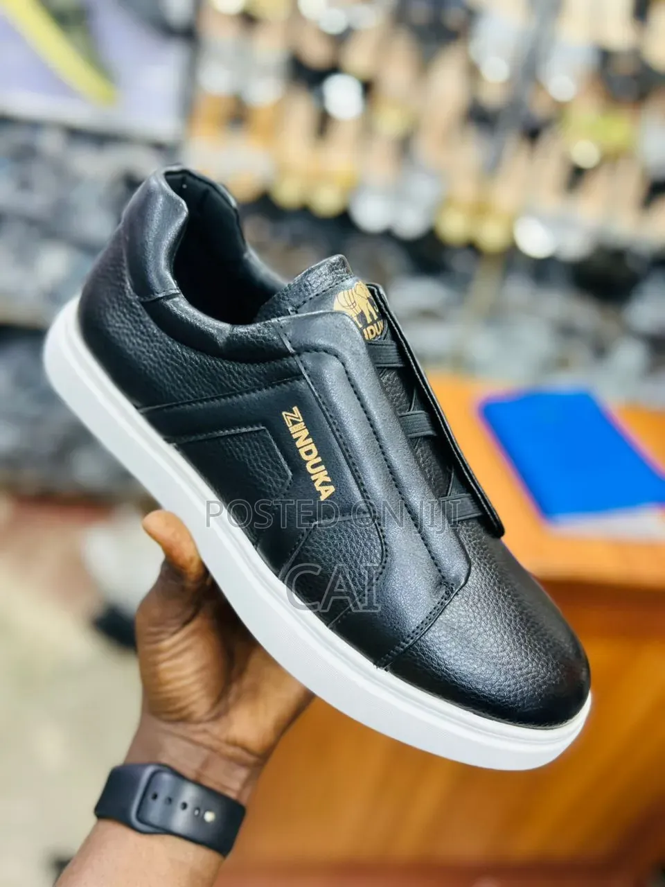 Navy Blue Zinduka Sneakers Featuring a Minimalist Slip-on Design