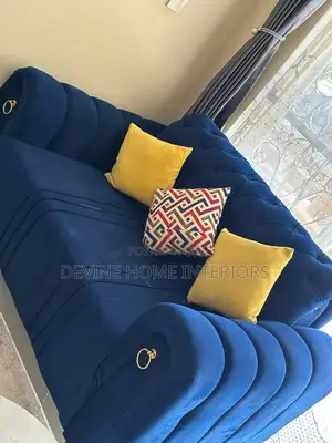 Luxe Royal‐Blue Tufted Sofa