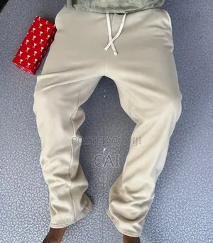 Unisex Open-Hem Buggy Sweaterpants in Grey and Black.