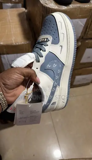 A Pair of Nike Air Force 1 Sneakers Multicolored Shoes