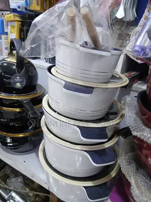Modern, Cream-Colored Non-Stick Pot Sets With a Speckled Blue