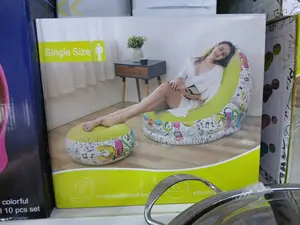 Inflatable Lounge Chair and Ottoman Set With a Graffiti
