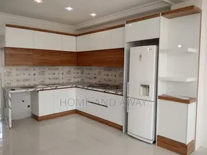 White L Shaped Kitchen Cabinets From 915,000/- Per Running Meter