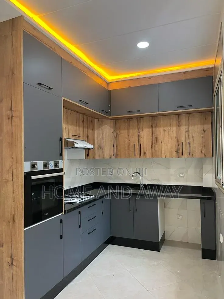 Perfect L Shaped Modern Elegant Kitchen Cabinets 890,000/- Per Meter