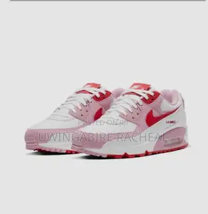 It’S A Nike Shoe , It Has Two Colors Pink Grey And Pink White
