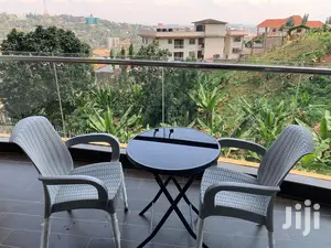 Foldable Glass Table and Plastic Chairs