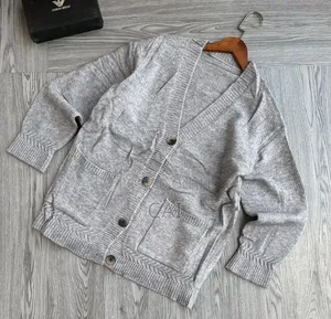 Cardigan Featuring Patch Pockets and Large Buttons.