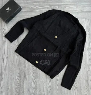 Cardigan Featuring Patch Pockets and Large Buttons.