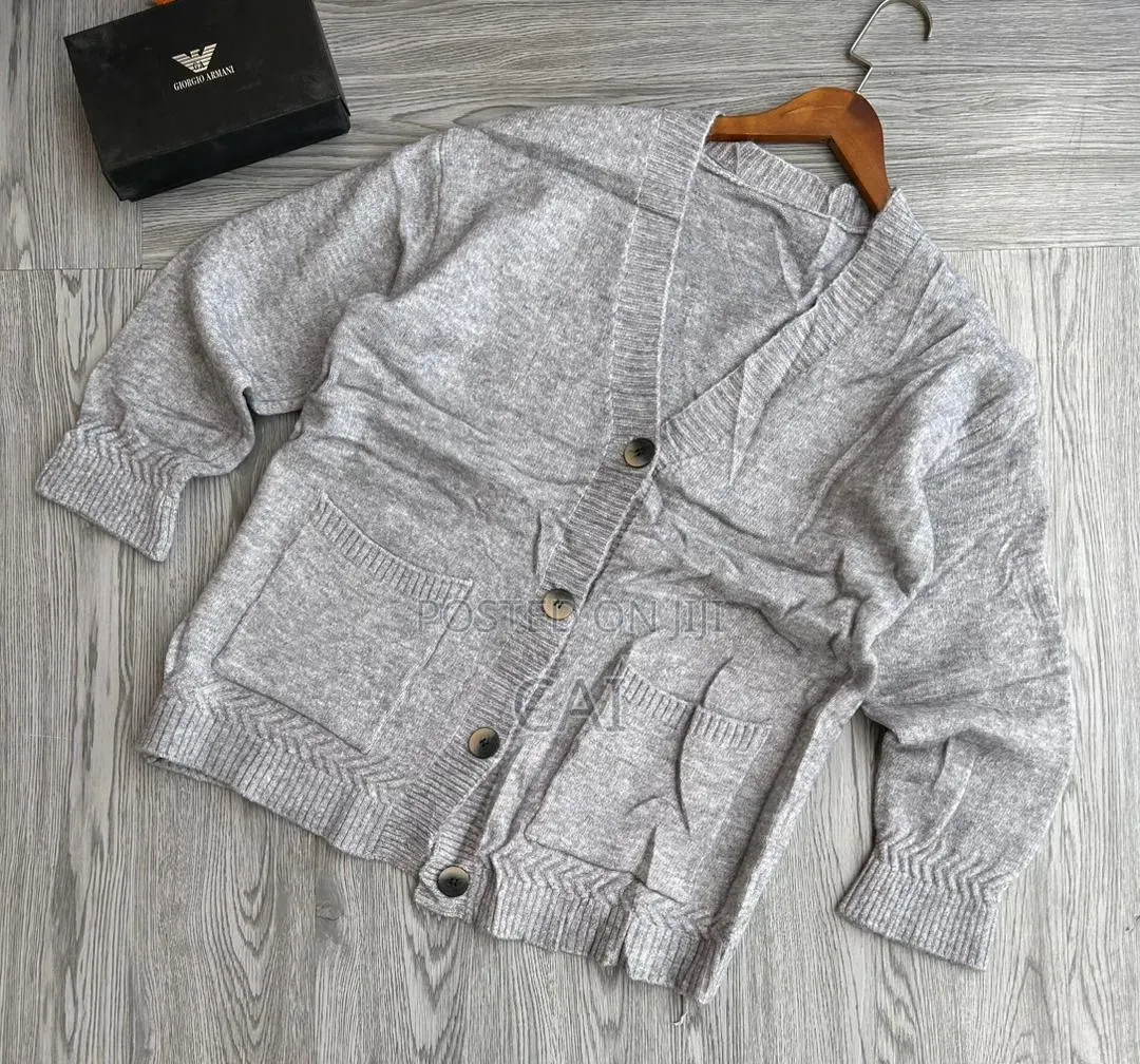 Cardigan Featuring Patch Pockets and Large Buttons.