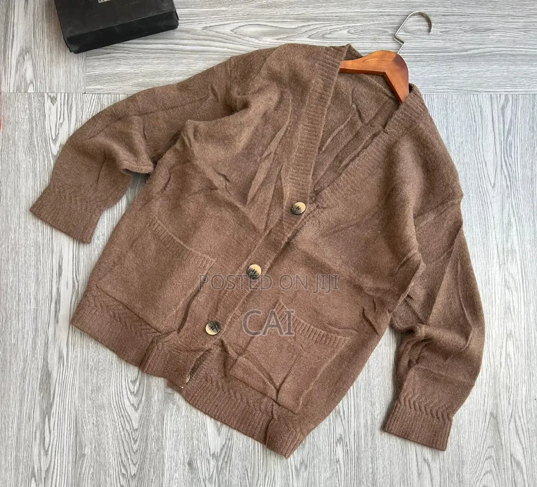 Cardigan Featuring Patch Pockets and Large Buttons.