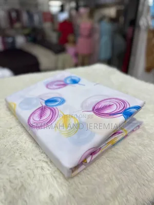 Apair of Bed Sheets and 2 Pillowcases