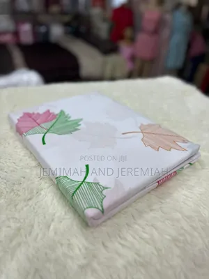 Apair of Bed Sheets and 2 Pillowcases